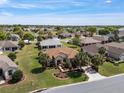 Lovely home with lush landscaping in a tranquil neighborhood with scenic views at 13109 Se 86Th Ct, Summerfield, FL 34491