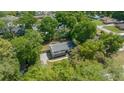 Birds eye view of this charming two-story home nestled among mature trees at 341 Se 53Rd Ct, Ocala, FL 34480