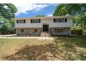 Charming two-story home with brick facade, newly landscaped yard, and inviting entrance at 341 Se 53Rd Ct, Ocala, FL 34480
