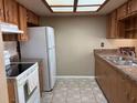 Functional kitchen featuring white appliances, ample cabinet space, and a clean, practical design at 3021 Se 5Th Ter # A, Ocala, FL 34471