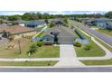 Desirable single-Gathering home with a manicured lawn, fenced yard, and two-car garage on a quiet street at 6437 Sw 45Th Ave, Ocala, FL 34474