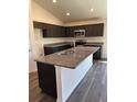 Kitchen with granite countertops, stainless steel appliances, and ample cabinet space at 3474 Sw 155Th Pl, Ocala, FL 34473