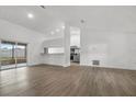 Bright living room featuring an open-concept design and sliding glass doors at 4246 Ne 32Nd Cir, Ocala, FL 34479