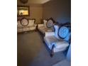 Comfortable living room with elegant furniture and ample natural light at 10999 Sw 47Th Ave, Ocala, FL 34476