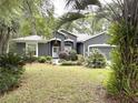 Lovely single-story home with manicured lawn, front yard landscaping and a driveway at 18956 Sw 93Rd Loop, Dunnellon, FL 34432