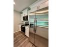 Modern kitchen featuring stainless steel appliances and ample cabinet space at 13518 Sw 114Th Ln, Dunnellon, FL 34432