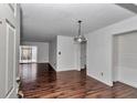 Inviting living room with new hardwood floors and slider doors for seamless indoor/outdoor living at 2837 Ne 3Rd St # 103, Ocala, FL 34470