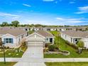 A nice home in a desirable community featuring beautiful landscaping and well-maintained lawns at 5220 Sunshine Dr, Wildwood, FL 34785