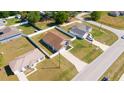 Beautiful aerial view of home featuring a fenced yard, long driveway, and proximity to neighborhood at 8004 Juniper Rd, Ocala, FL 34480