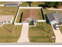 Charming single-Gathering home featuring a well-maintained lawn and a fully fenced backyard at 8004 Juniper Rd, Ocala, FL 34480