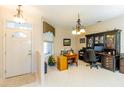 Inviting office space featuring tile floors, neutral colors, and traditional-style furnishings at 1763 Sw 155Th Place Rd, Ocala, FL 34473