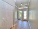 Welcoming foyer with tiled floors, closet and a view of the front door at 4763 Se 25Th Loop, Ocala, FL 34480