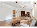 Open-concept living space that includes a seating area, dining space, and kitchen beyond at 16295 W Highway 40, Ocala, FL 34481
