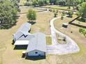 Sprawling rural property showcasing the home, a gazebo, and fenced pastures at 1711 Sw 63Rd St Rd, Ocala, FL 34476