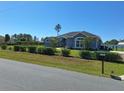 Charming single-story home featuring well-manicured landscaping at 4770 Sw 114Th St, Ocala, FL 34476