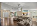 Spacious living room with hardwood floors, recessed lighting, and open layout at 4939 Sw 99Th Pl, Ocala, FL 34476