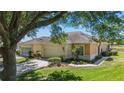 Spacious home with a two-car garage and an additional single-car garage at 9591 Sw 70Th Loop, Ocala, FL 34481