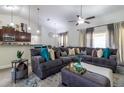 Inviting living room showcasing a comfortable sectional sofa and modern decor at 9721 Sw 53Rd Ct, Ocala, FL 34476