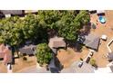 Aerial view of a home highlighting the backyard, surrounding trees, and neighborhood layout at 10 Banyan Track Way, Ocala, FL 34472