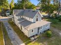 Aerial view of a two-story home showing the back exterior and surrounding yard at 721 Ne 2Nd St, Ocala, FL 34470
