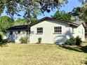 Charming single-story home featuring a cozy front porch and well-maintained landscaping in a serene neighborhood at 2138 Sw 9Th Rd, Ocala, FL 34471