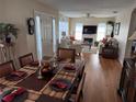 Inviting dining area adjacent to the living room, perfect for Gathering gatherings at 11120 Sw 71St Terrace Rd, Ocala, FL 34481