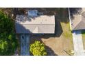 Aerial view of a single-story home with a driveway and mature trees at 16 Water Trak, Ocala, FL 34472
