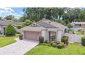 Single car garage and manicured lawn at 4404 Ne 4Th St, Ocala, FL 34470