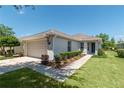 Well-maintained exterior showcasing a lovely home with a manicured lawn at 7249 Sw 93Rd Ave, Ocala, FL 34481