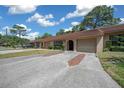 Well-maintained home with an arched entryway and an attached garage set in a tranquil neighborhood at 3449 Sw 19Th St, Ocala, FL 34474