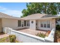 Rear patio with brick and access to the home's multiple windows at 11146 Sw 68Th Ct, Ocala, FL 34476