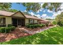 Welcoming front exterior showcasing well-maintained landscaping and charming curb appeal at 4530 Nw 78Th Ave, Ocala, FL 34482