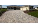 Charming single-Gathering home with a well-manicured lawn and a spacious two-car garage at 10530 Sw 98Th Pl, Ocala, FL 34481