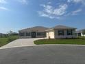 Charming single-Gathering home with a well-manicured lawn and a spacious two-car garage at 10530 Sw 98Th Pl, Ocala, FL 34481