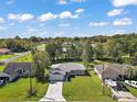 Aerial of a single-story home highlighting the location and surrounding neighborhood at 6730 Cherry Rd, Ocala, FL 34472