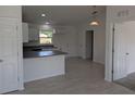 Bright open kitchen with modern appliances and eat in bar at 2803 Sw 147Th Ct, Ocala, FL 34481