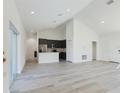 Open-concept living space seamlessly connects the living room to the kitchen, perfect for entertaining at 4415 Sw 169Th Lane Rd, Ocala, FL 34473