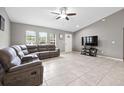 Open living room featuring tile flooring, recessed lighting and a ceiling fan at 60 Hemlock Trl, Ocala, FL 34472