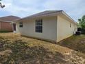Rear exterior view of house at 17974 Se 115Th Cir, Summerfield, FL 34491