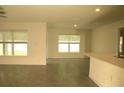The living room features tile flooring, recessed lighting, and natural light at 356 Se 66Th Ct, Ocala, FL 34472