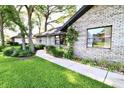 Charming brick home with manicured landscaping and a welcoming walkway at 5351 Sw 80Th Pl, Ocala, FL 34476