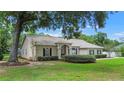 Well-maintained single-story home with neat landscaping, and a welcoming front entrance at 1617 Se 29Th Ter, Ocala, FL 34471