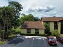 Attractive condo with well-maintained landscaping and a convenient parking area for guests at 519 Fairways Cir # A, Ocala, FL 34472