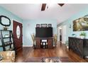 Comfortable living room with warm wood floors and lots of natural light at 8140 Sw 109Th Street Rd, Ocala, FL 34481