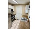 Functional kitchen with stainless steel appliances and granite countertops at 5549 Nw 64Th St, Ocala, FL 34482