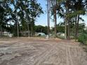A large, cleared backyard is ready to be landscaped for outdoor activities and enjoyment at 5787 Nw 58Th Ter, Ocala, FL 34482