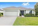 Charming one-story home with well-manicured lawn and a two-car garage at 6651 Sw 93Rd Ct, Ocala, FL 34481