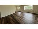 Cozy living room with modern flooring, filled with natural light at 8901 Sw 103Rd Ln, Ocala, FL 34481