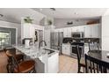 Well-lit kitchen featuring granite countertops, stainless steel appliances, and ample storage at 5437 Se 34Th St, Ocala, FL 34480