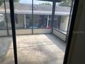 Enclosed patio area, great for relaxing or entertaining outdoors at 1408 Torrey Pines Dr, Lady Lake, FL 32159